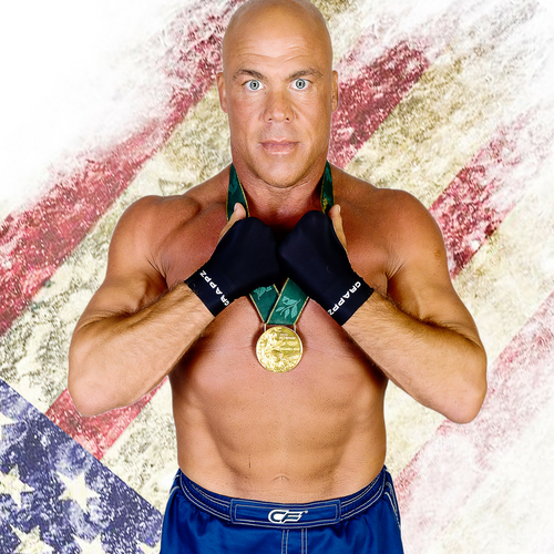 Olympic gold medalist in freestyle wrestling and WWE champion, Kurt Angle wearing finger support compression gloves, Grappz for grip strength and a better alternative to finger tape.