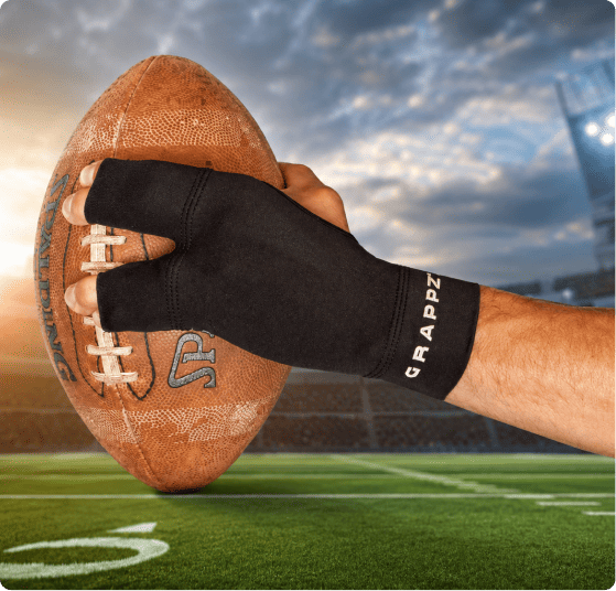 Football player wearing GRAPPZ finger protection